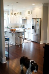 050-greenville-new-construction-sims-kitchen-refrigerator-stove-bar.jpg