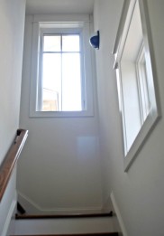 110-greenville-new-construction-lake-home-guest-house-stair-window.jpg