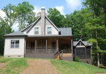 010-greenville-new-construction-sims-front-elevation-exterior-steep-gabled-roof-screened-porch.jpg